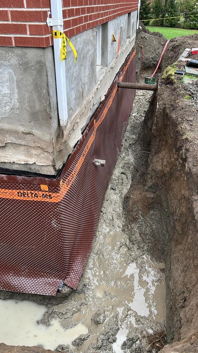 Foundation excavation & membrane — Excavatron job site