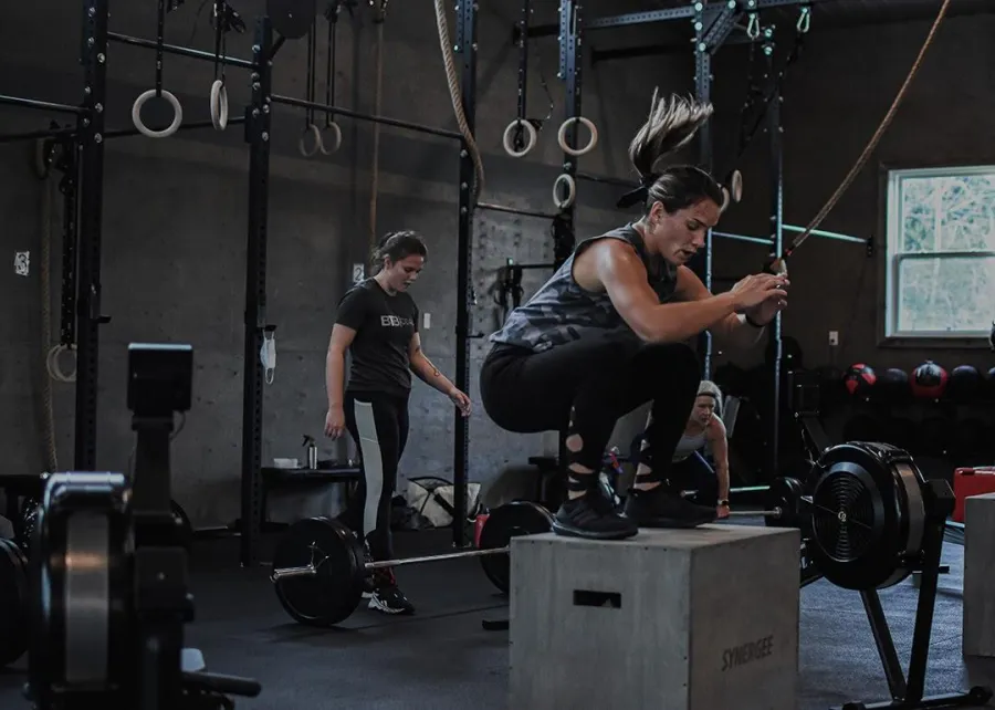 A BoxingFit pad-work session at Between The Bumpers