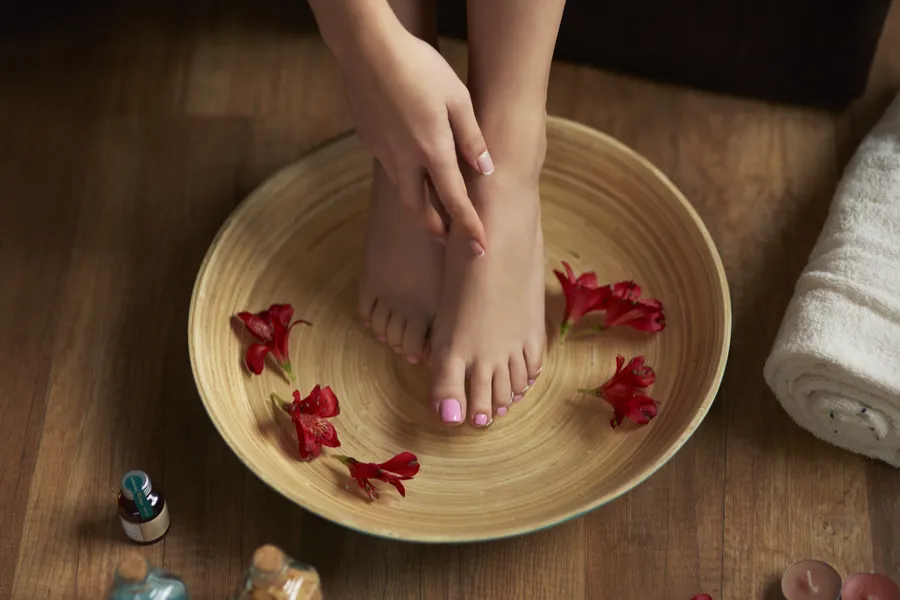 Spa pedicure soak with rose petals