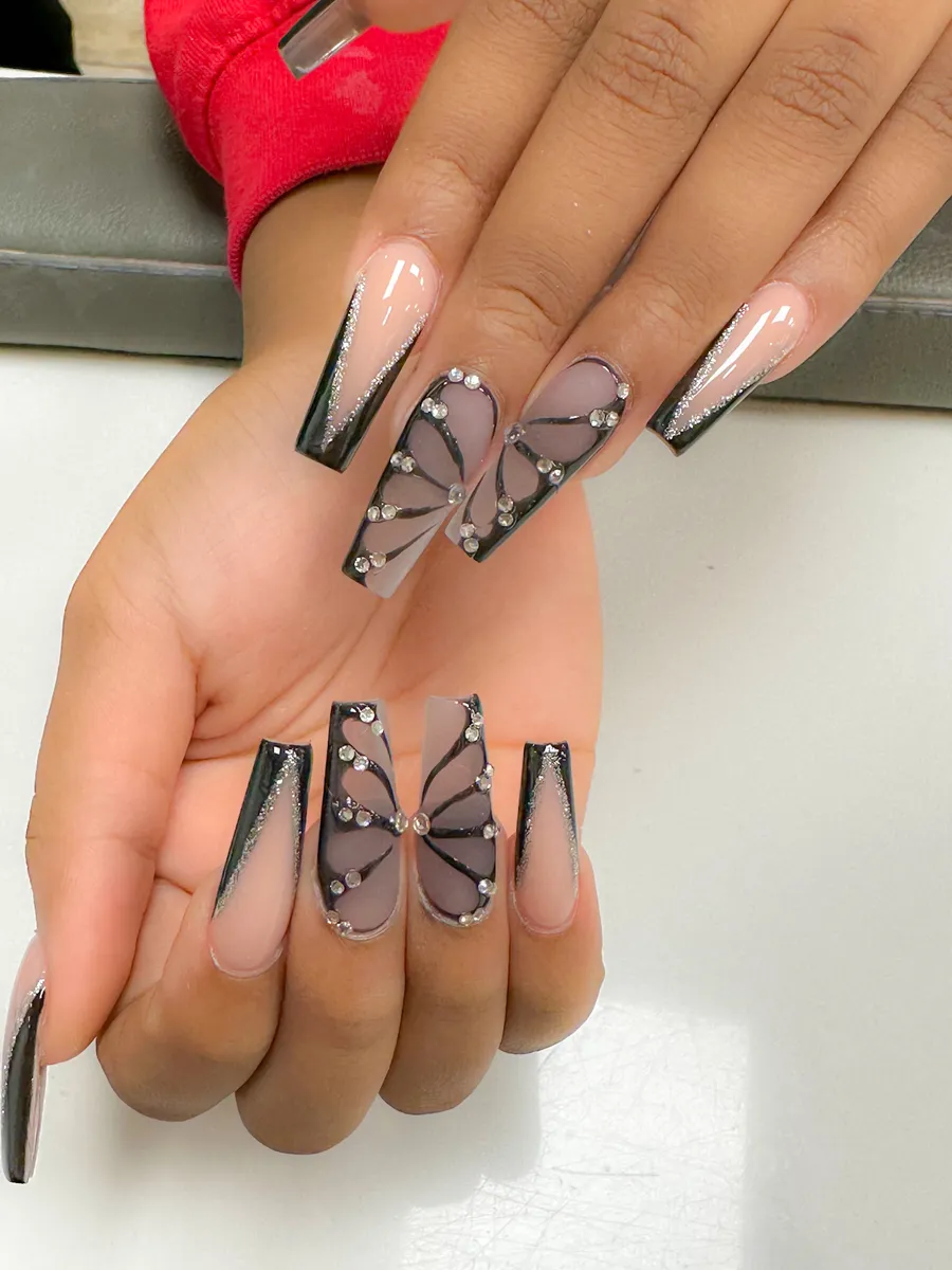 Nude and black butterfly nail art