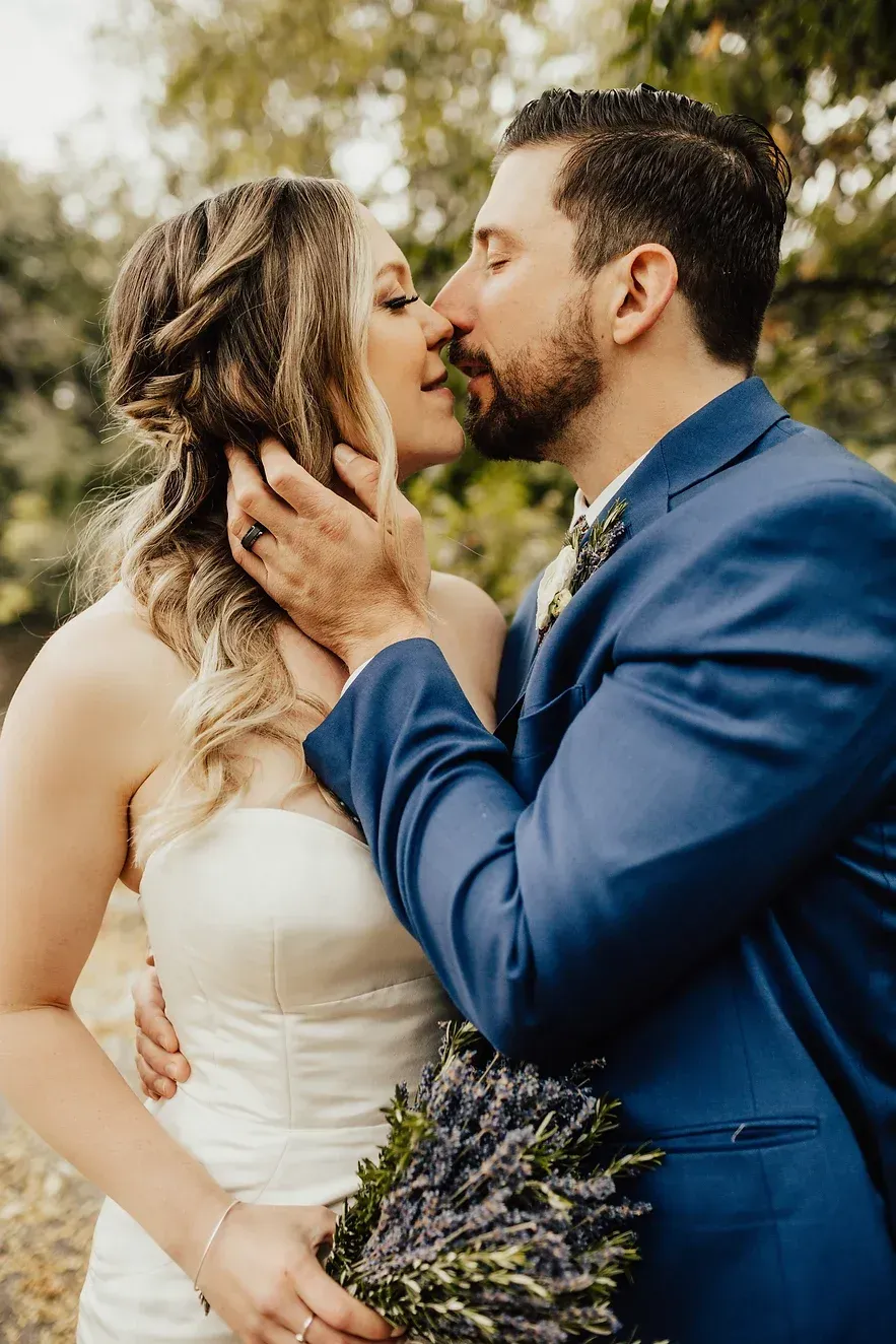 Wedding couple with bridal hair and makeup by City Lights Beauty Agency