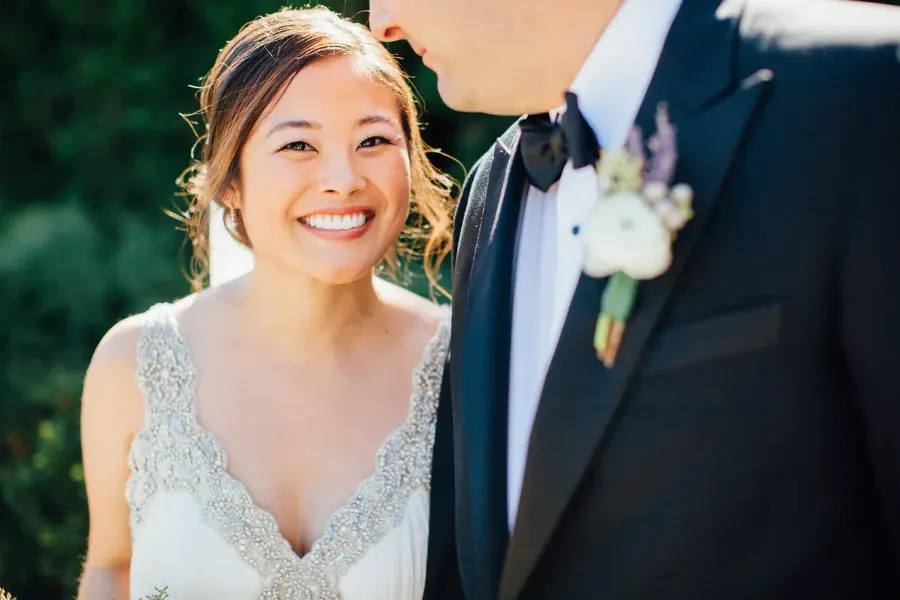 Wedding couple with bridal hair and makeup by City Lights Beauty Agency