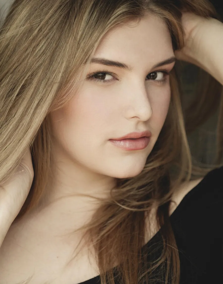 Natural beauty close-up with soft, even skin and brunette hair
