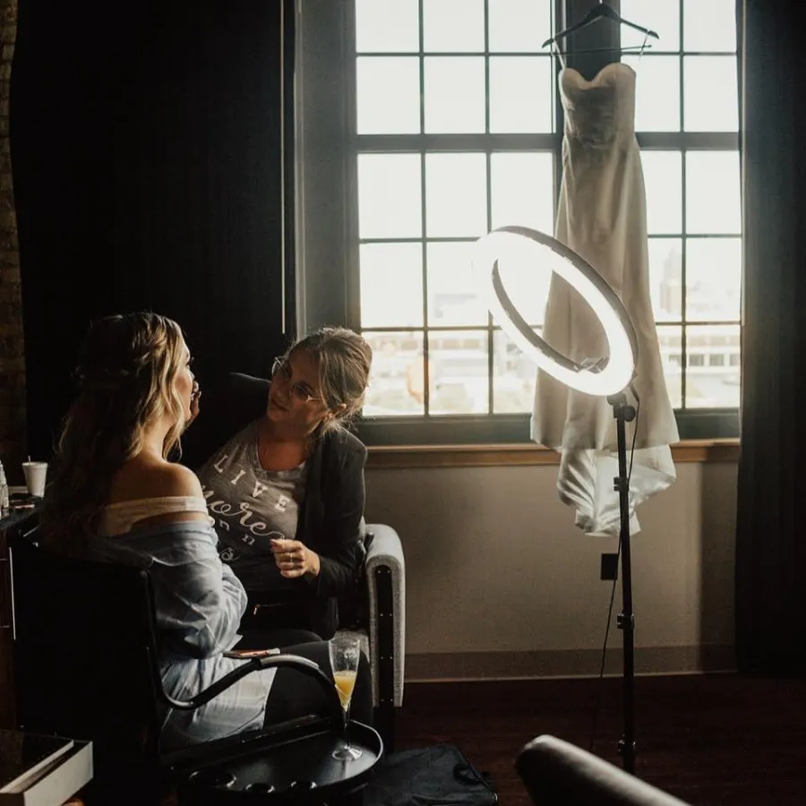 City Lights hair and makeup artist working on set
