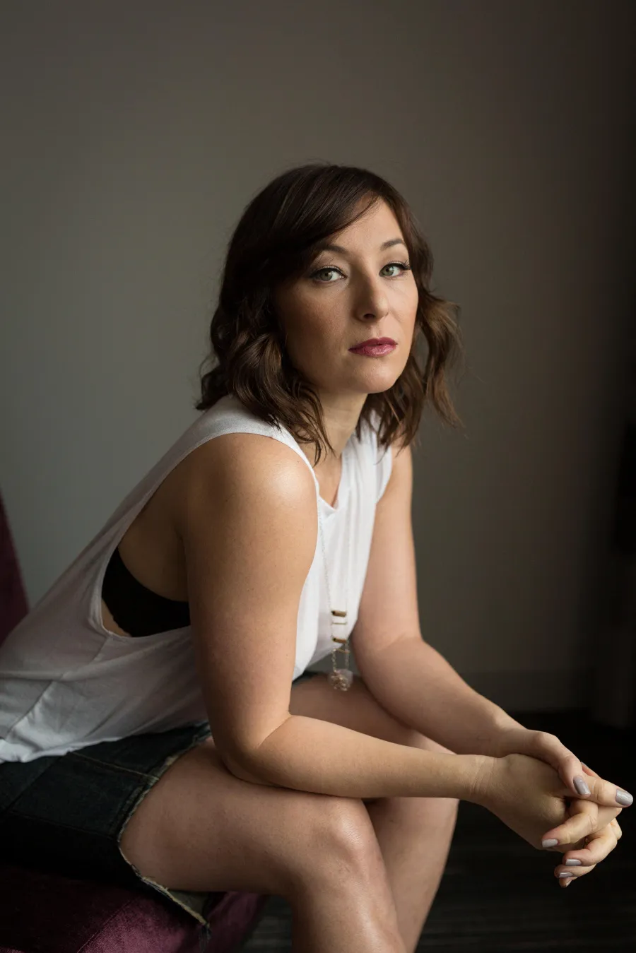 Talent portrait seated in soft window light