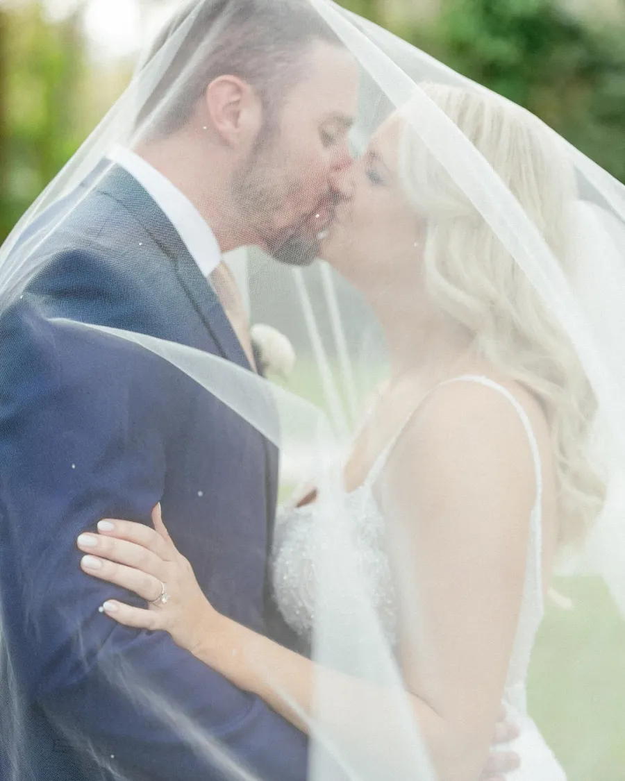 Wedding couple with bridal hair and makeup by City Lights Beauty Agency