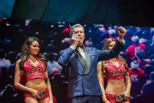 Host on stage with performers at a Heineken event in Chicago
