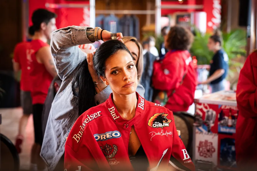 Guests getting hair and makeup at the Budweiser branded glam booth