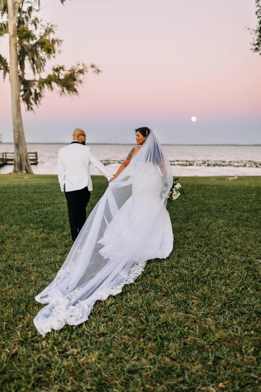 Wedding couple with bridal hair and makeup by City Lights Beauty Agency