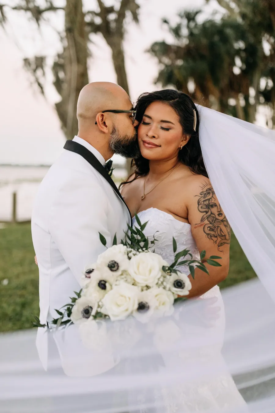 Wedding couple with bridal hair and makeup by City Lights Beauty Agency