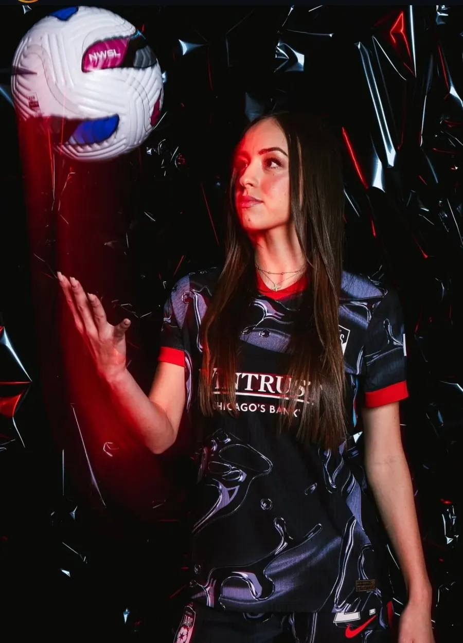 Chicago Stars FC player photographed with a match ball at NWSL media day