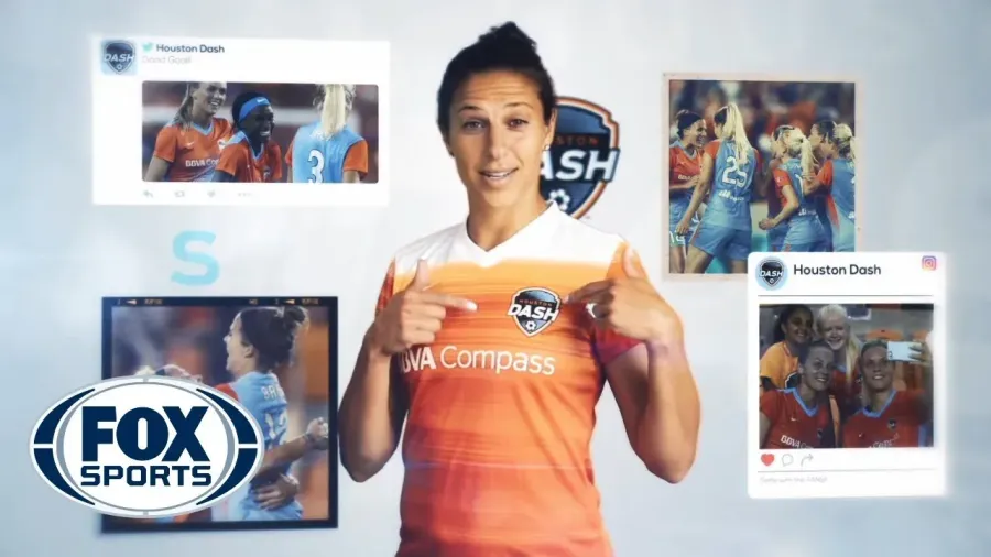 Soccer player in an orange jersey speaking to camera in a FOX Sports broadcast segment