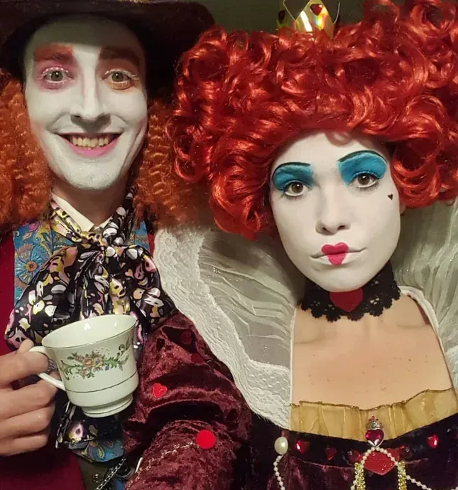 Mad Hatter and Red Queen character makeup for an event
