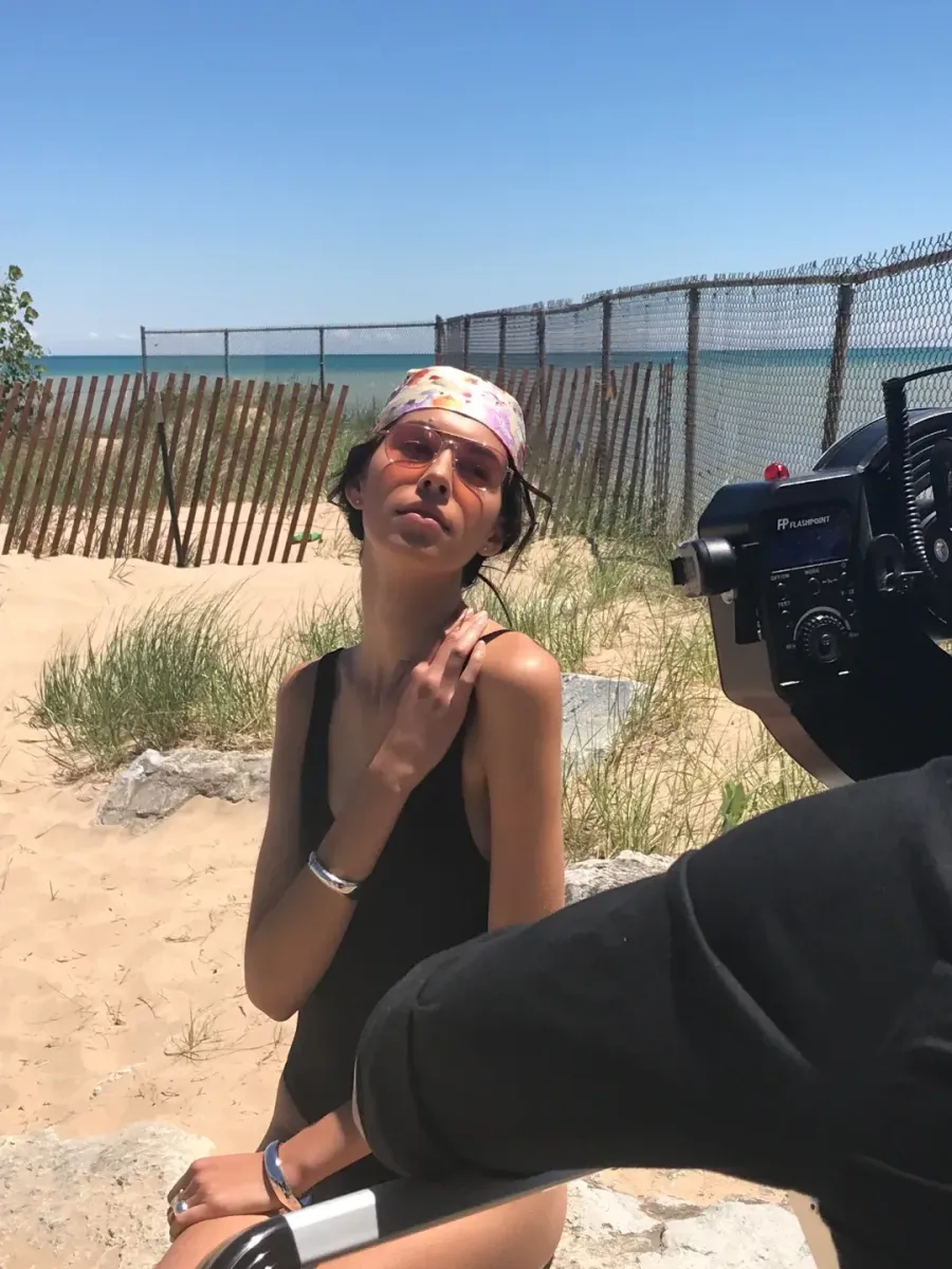 Camera rig framing talent on an outdoor location shoot by the water