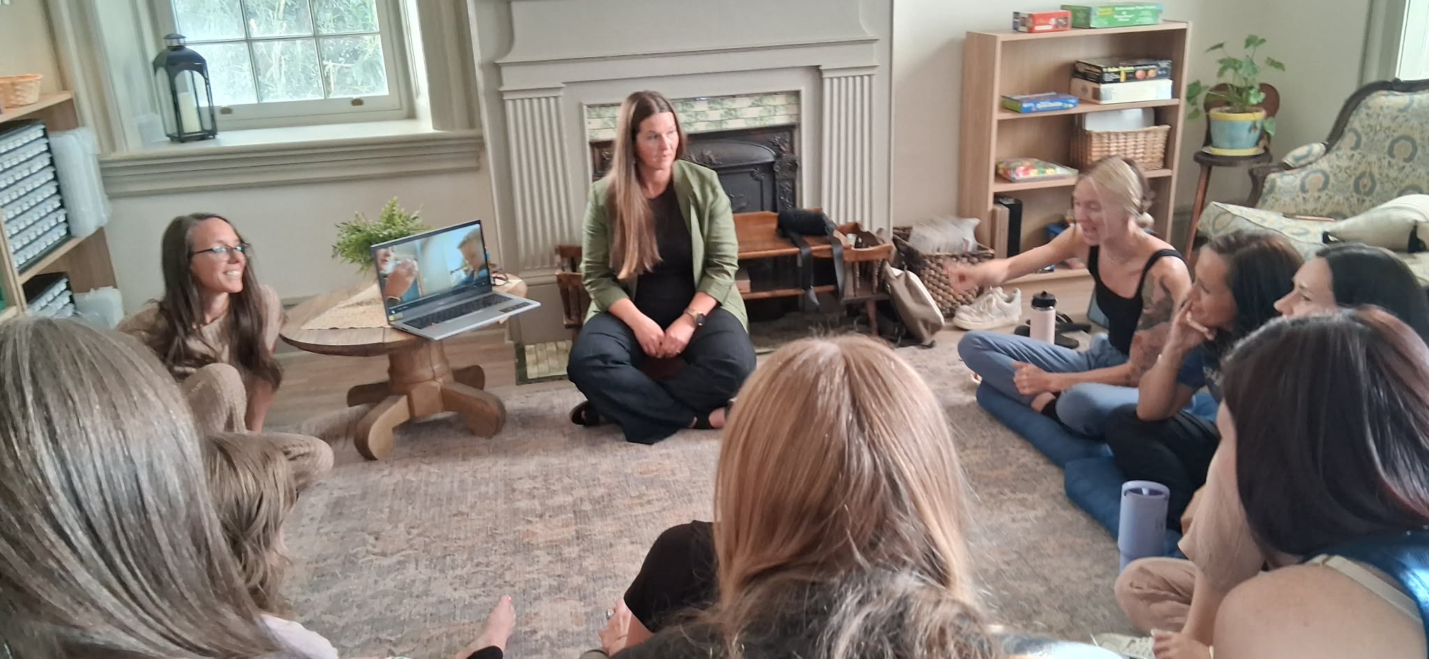 Bethany leading a live group session with adults