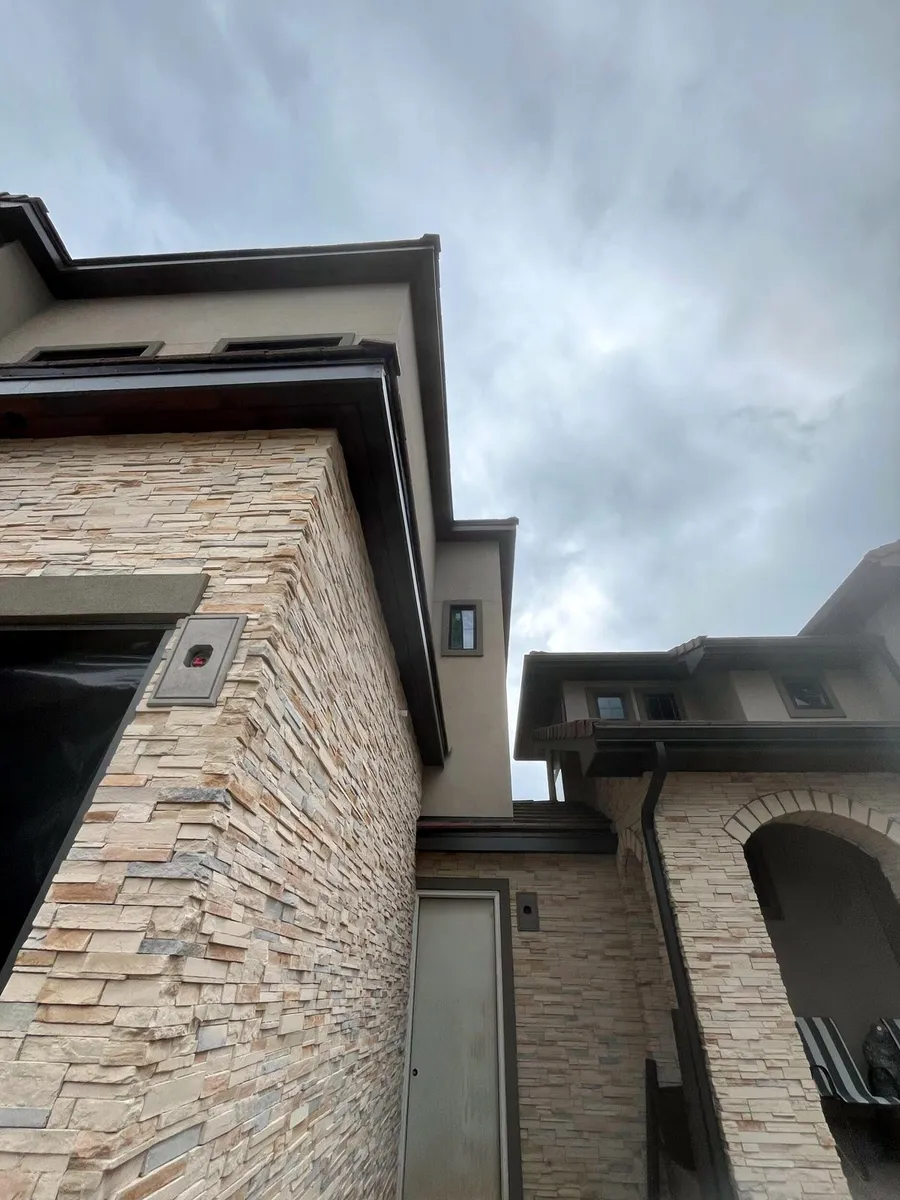 New construction exterior with painted stucco and trim
