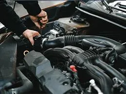 Technician at work inside the Duluth Auto Service and Imports workshop in Duluth, Georgia