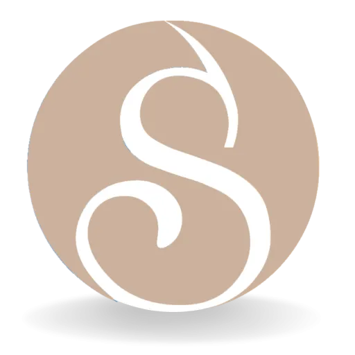 Clean, professional medical spa treatment room with neutral tones at Serendipity Spa in Des Moines