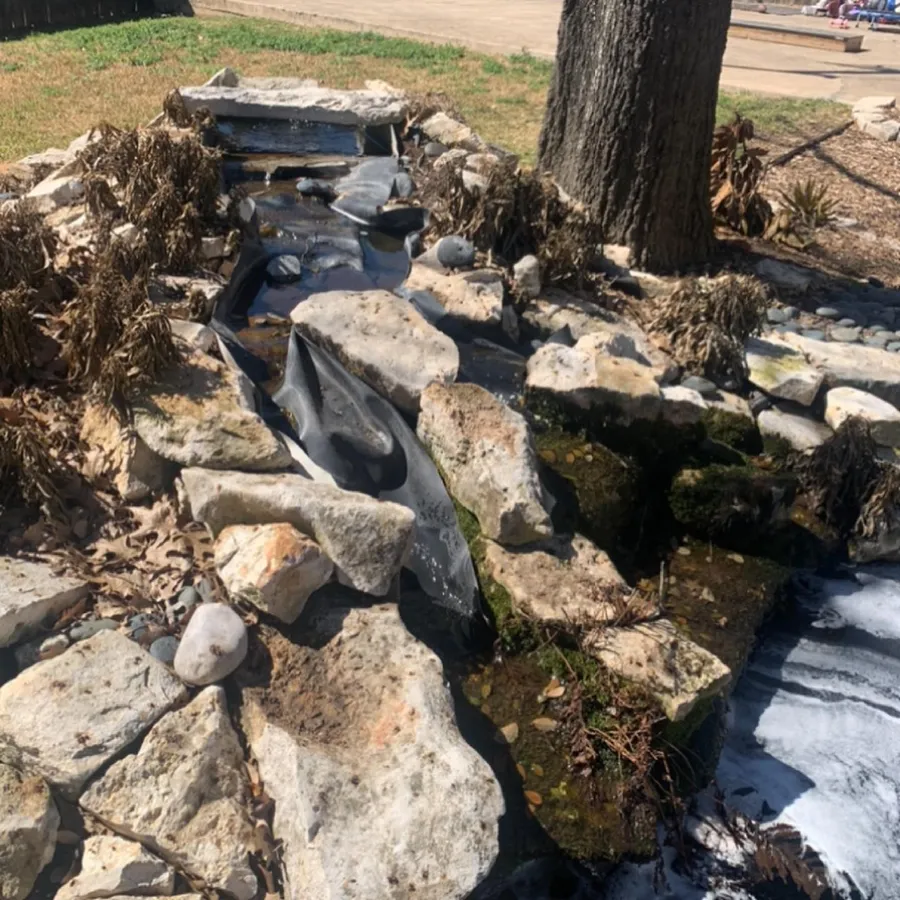 Waterfall liner being set before the stone