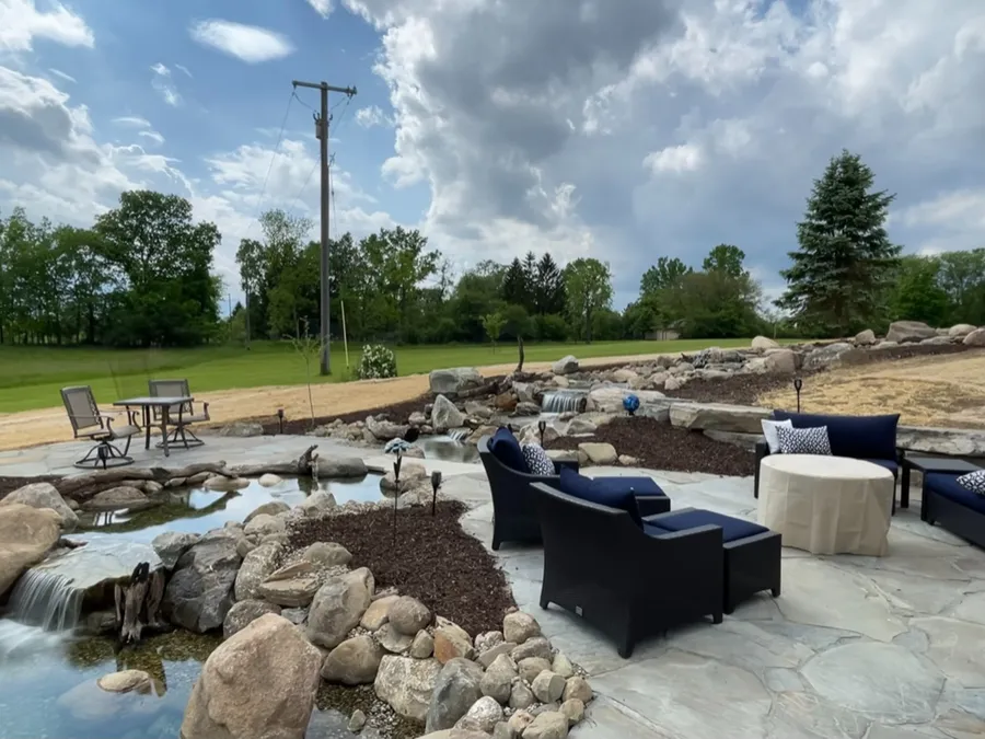 Water feature beside an outdoor seating area