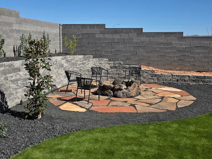 Backyard patio with stone wall