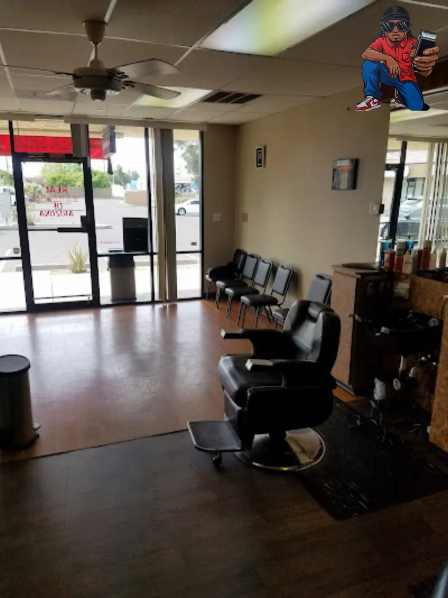 Inside Real Barbers of Arizona, barber chairs and storefront windows