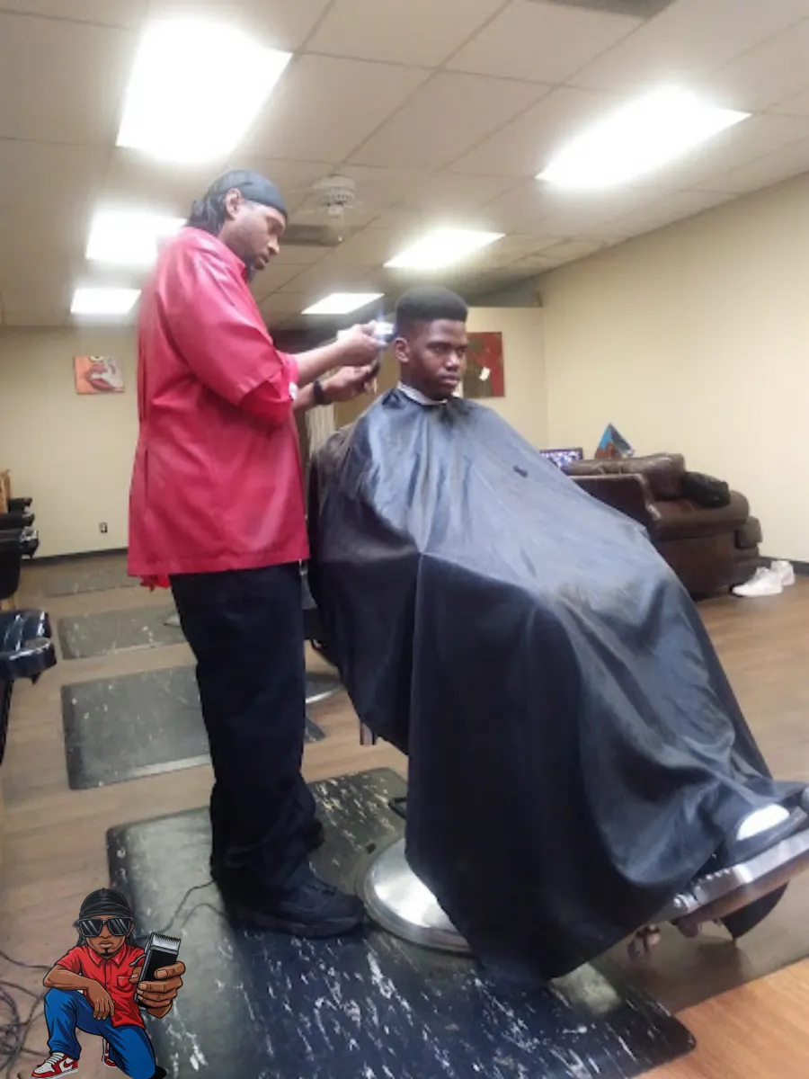 Barber at work with a client on the shop floor