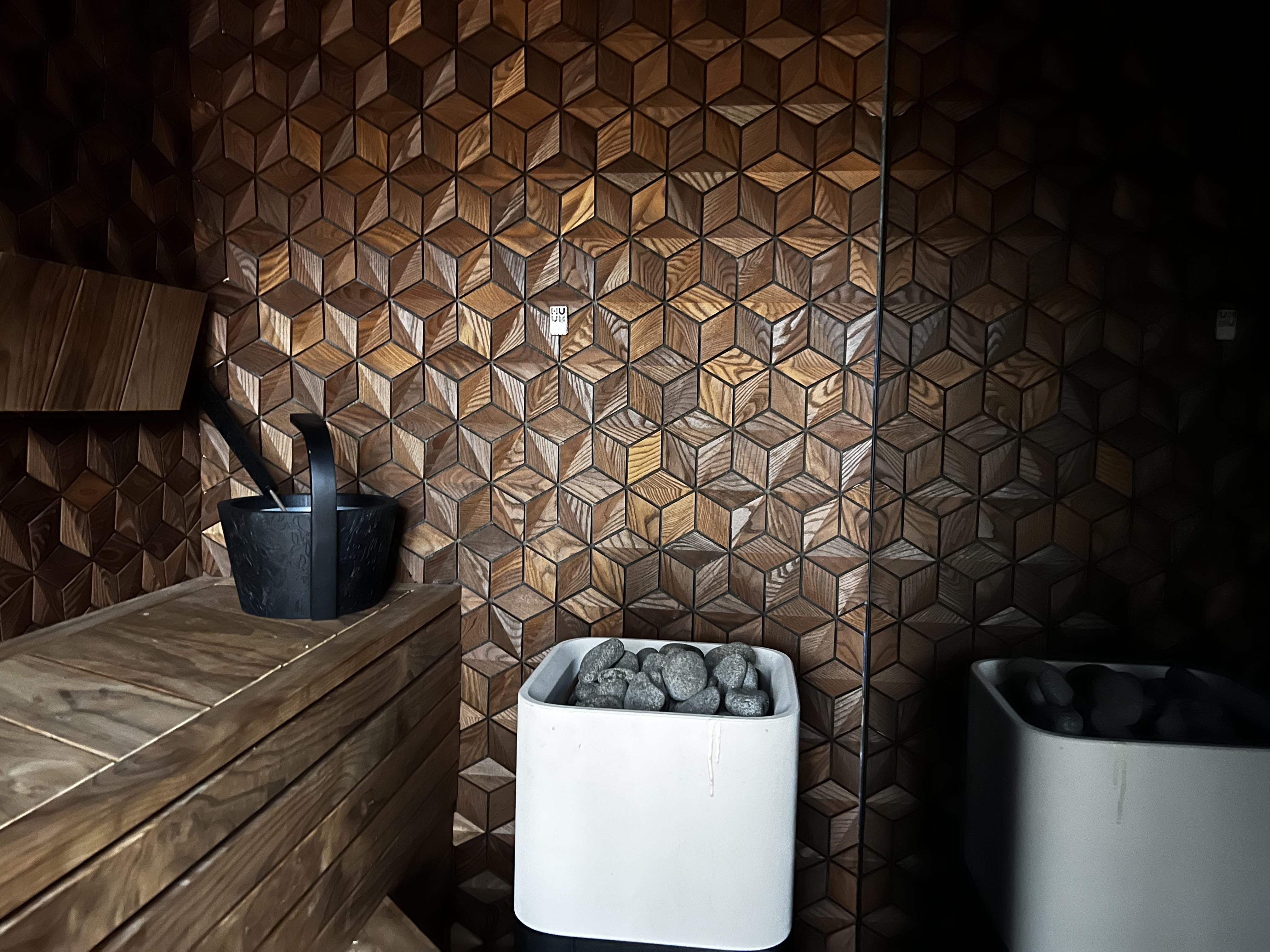 Geometric panels in a sauna