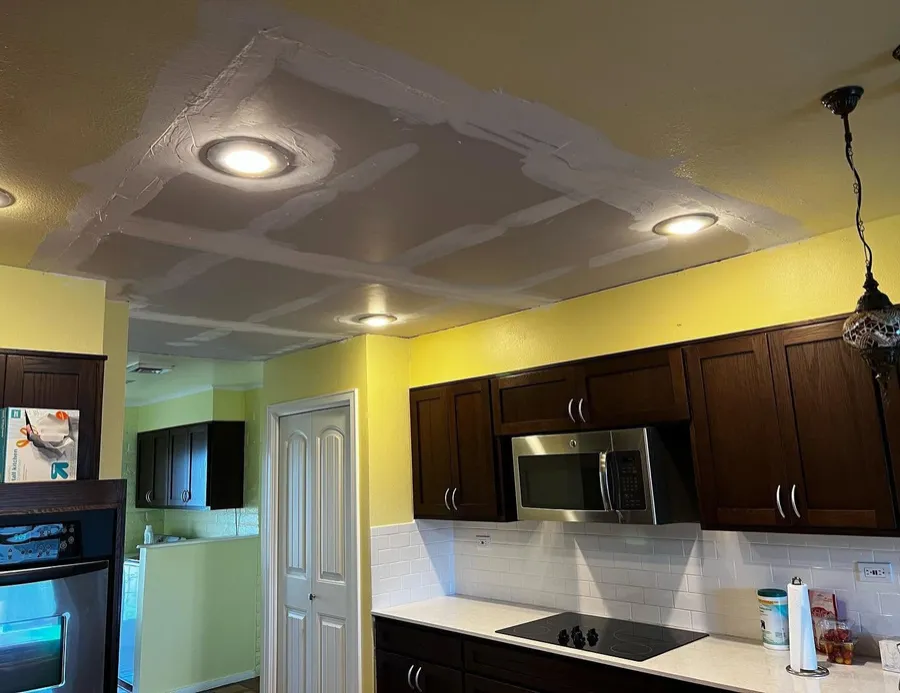 Kitchen with a freshly finished ceiling and recessed lights