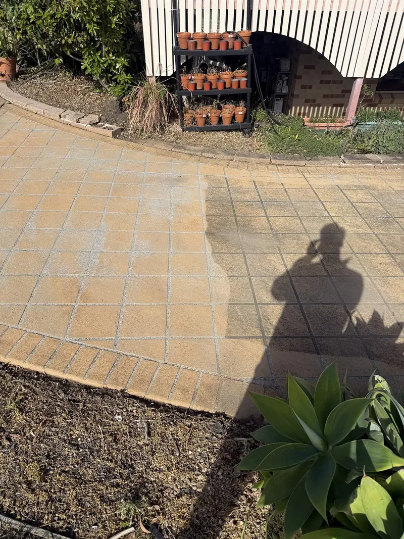 Pavers part way through pressure cleaning