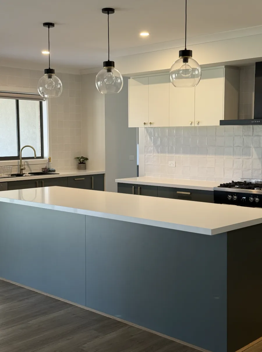 Open plan kitchen with protected stone benchtop