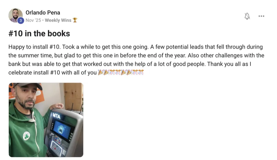 A community member's post: number 10 in the books, with a photo beside an ATM