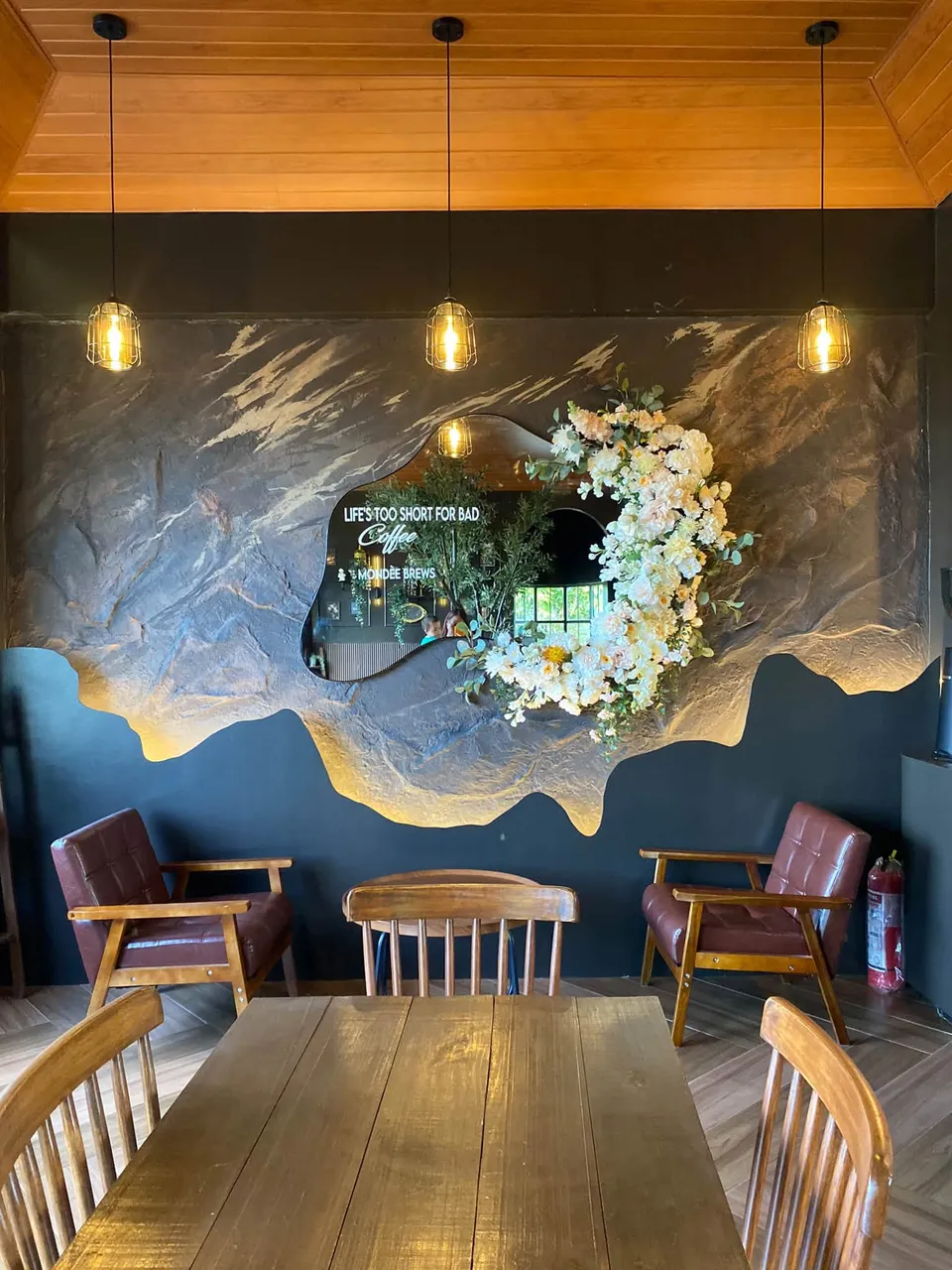 Wood plank ceiling and stone wall