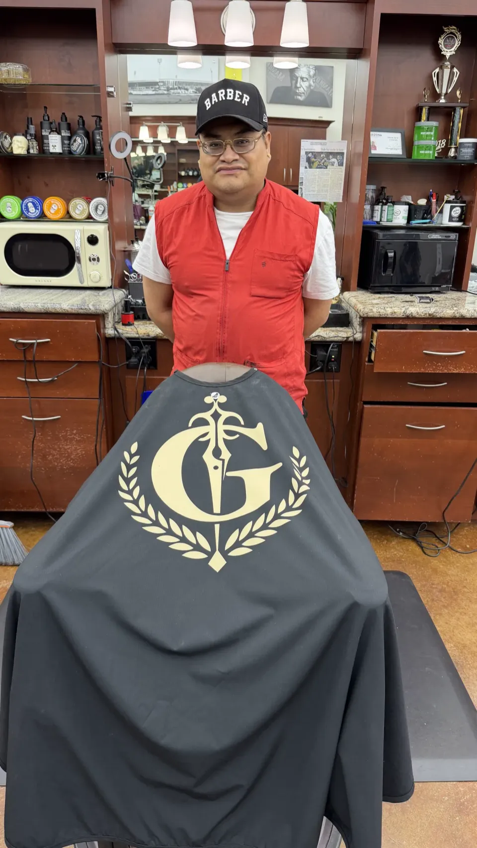 Frankie Fresh at his station with the gold crest cape