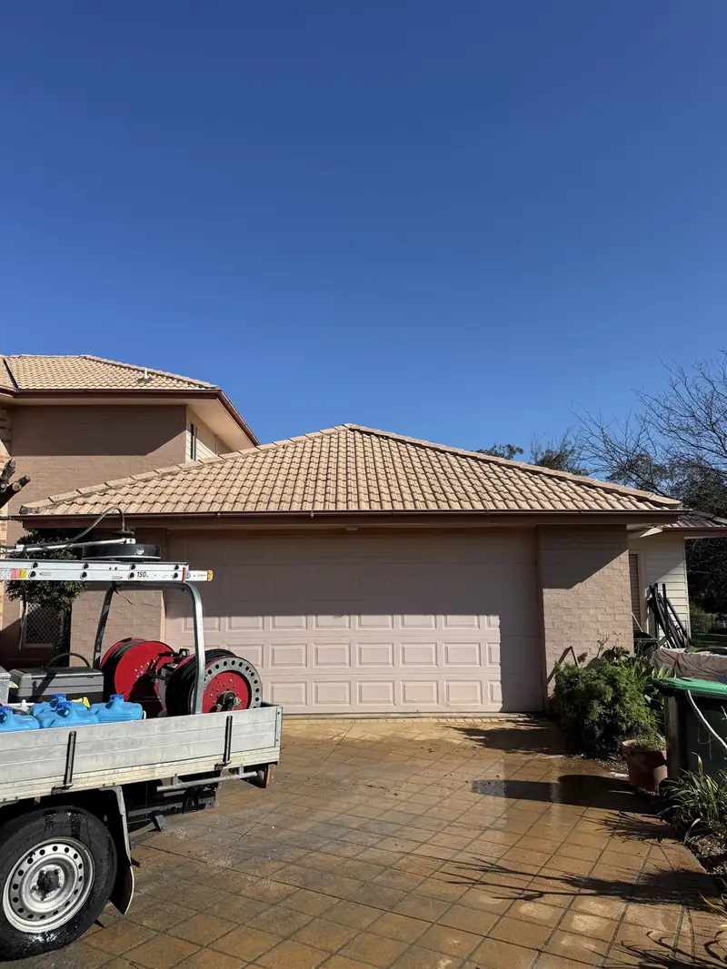 The same Shellharbour house after roof cleaning, tiles back to a clean terracotta colour