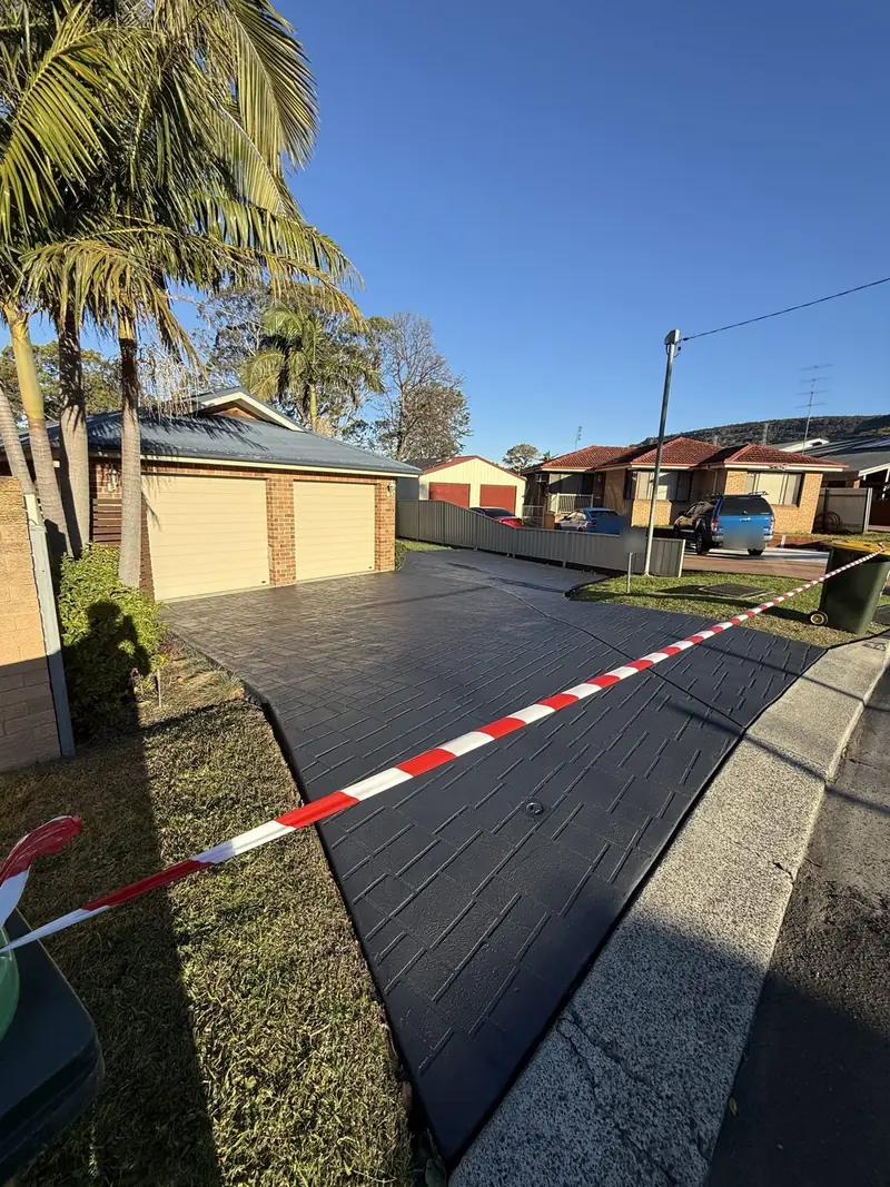 The same driveway after cleaning and colour sealing