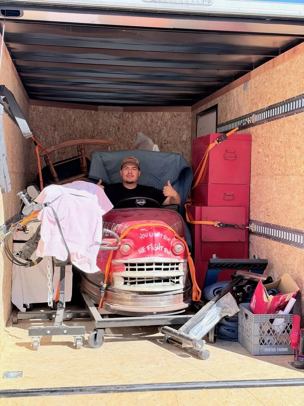 Josue in a fully loaded QuickHaul trailer