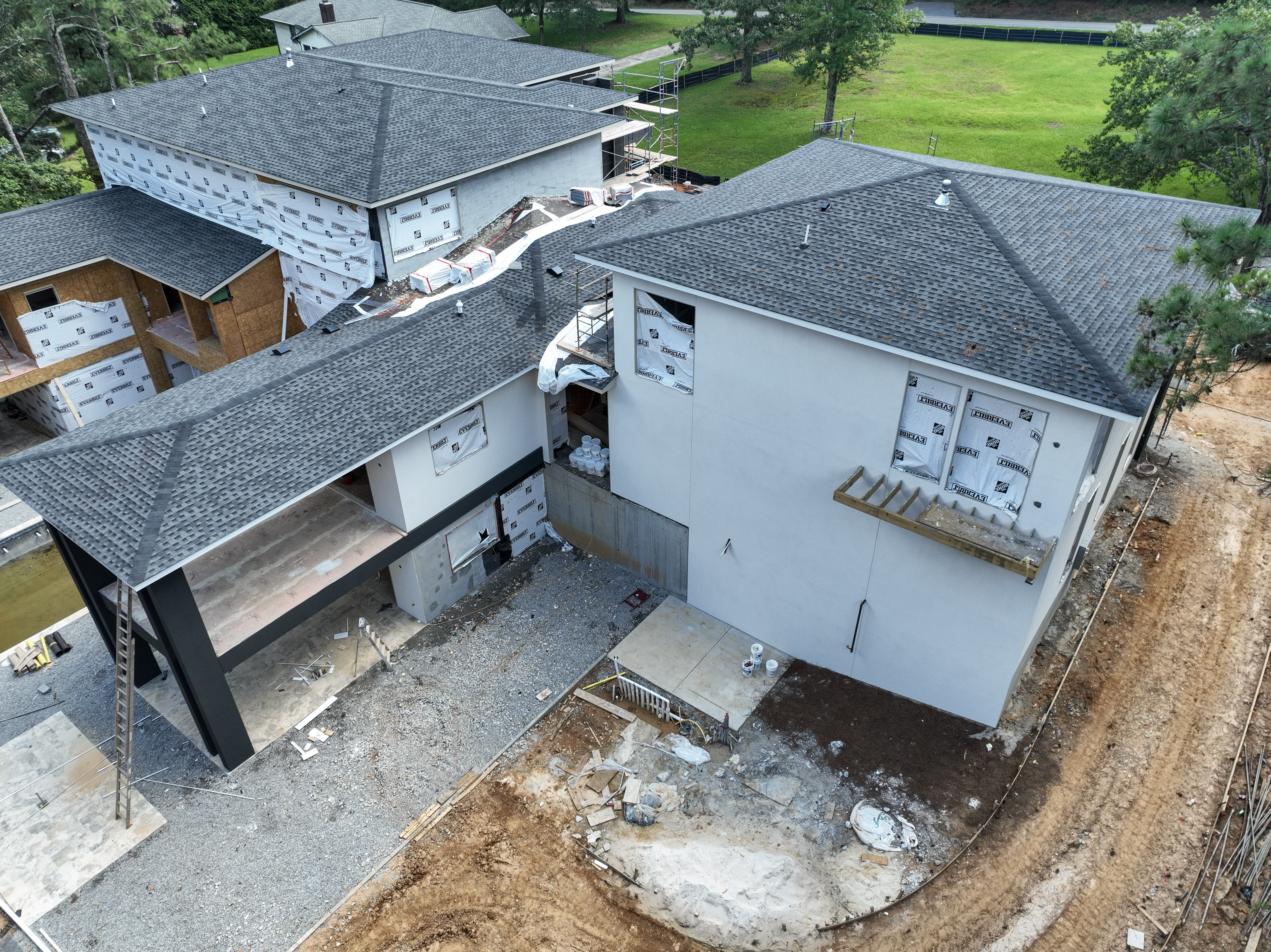 Aerial oblique view showing roof and courtyard construction conditions