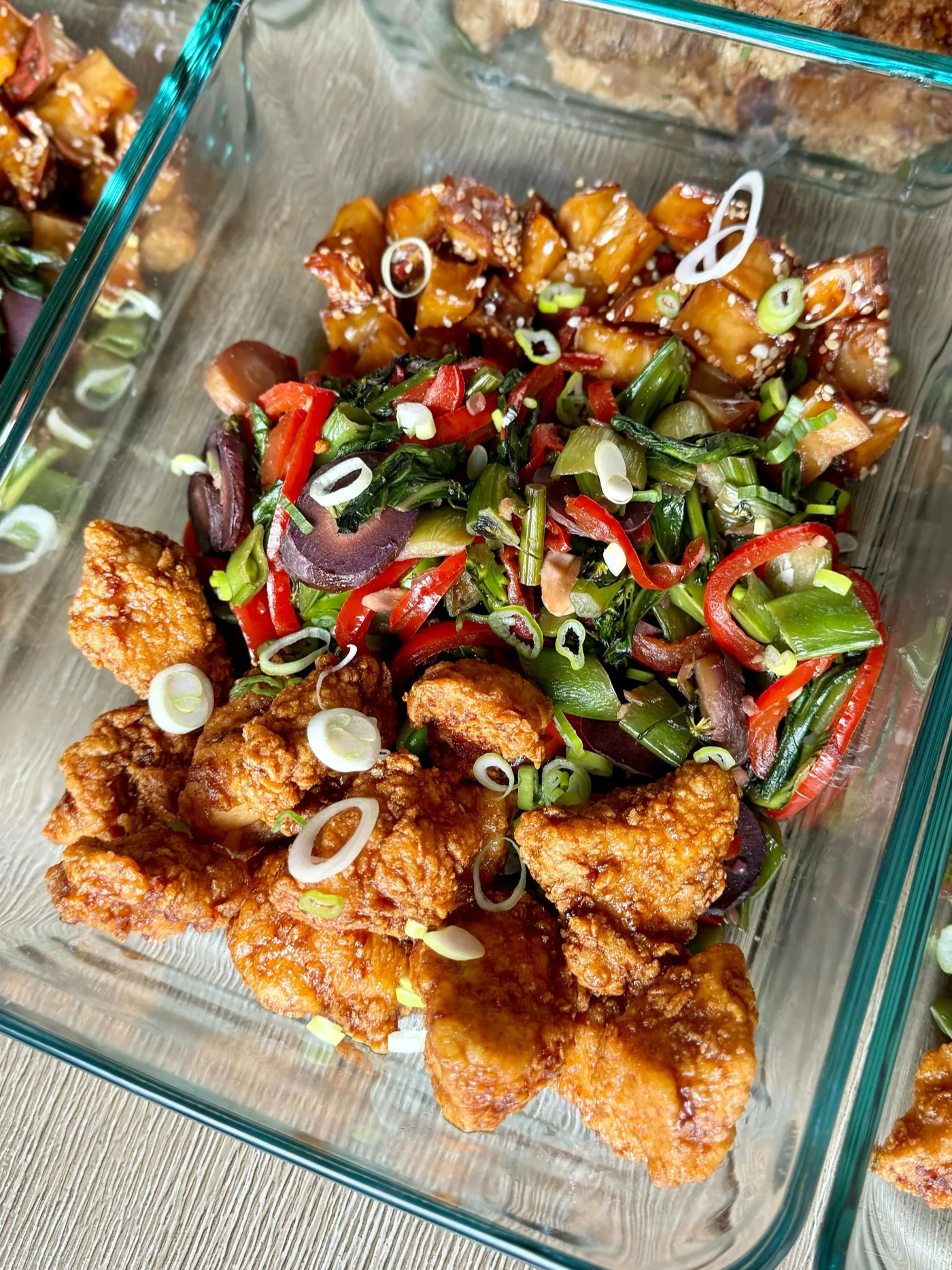 Crispy orange chicken with peppers and scallions