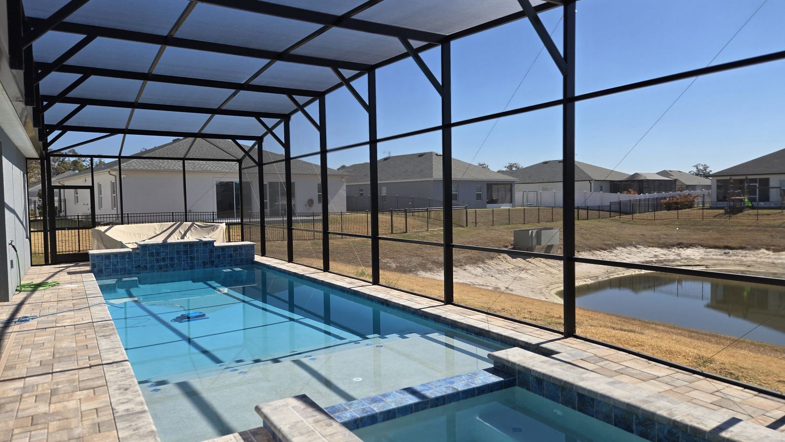 Screen repair and rescreen, view from inside the enclosure — Strong Tower Aluminum Construction, Central Florida