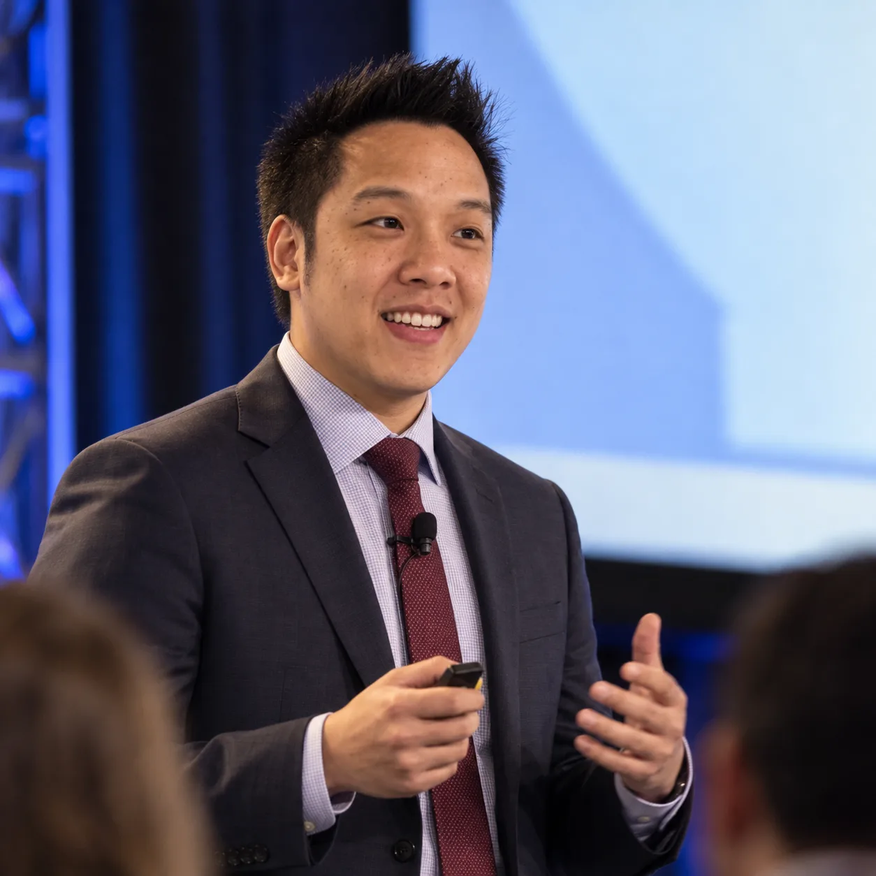 James Nguyen speaking at a conference