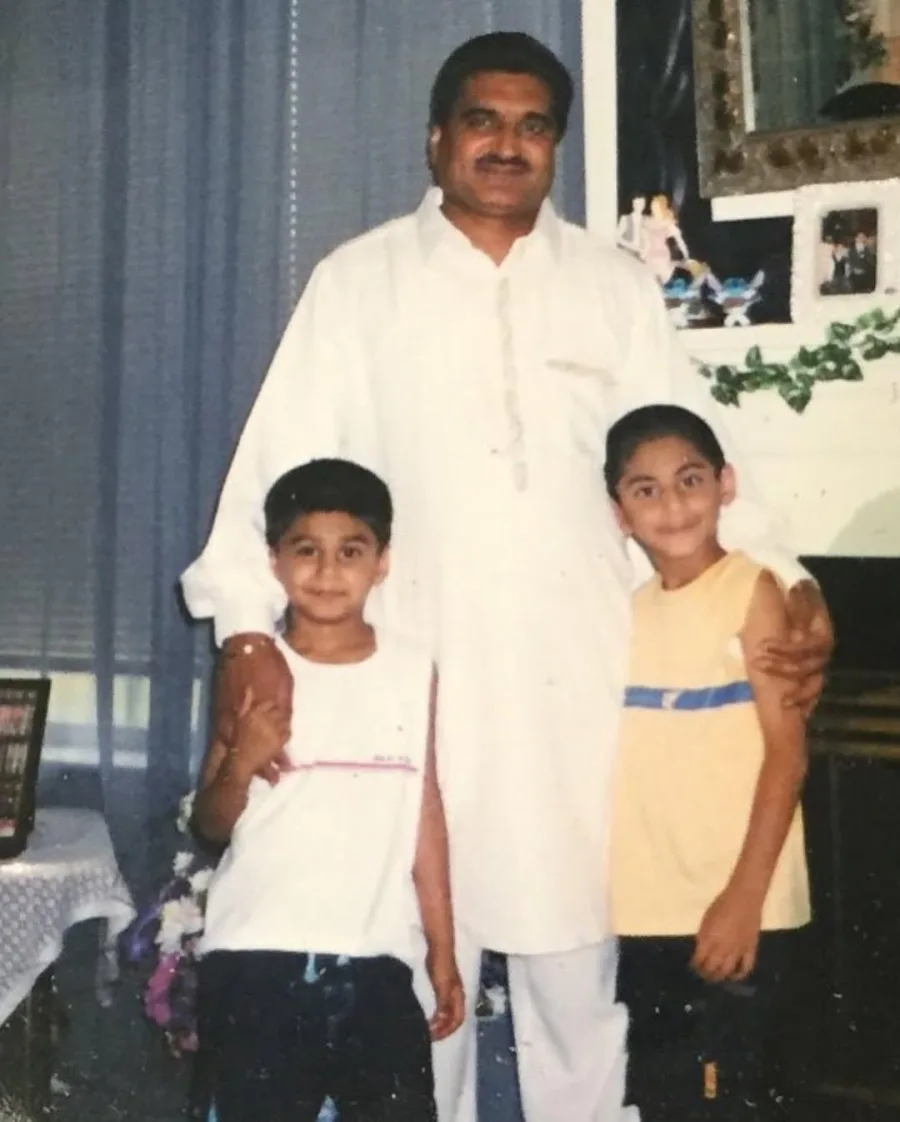 Pritinder's father with his two sons when they were young
