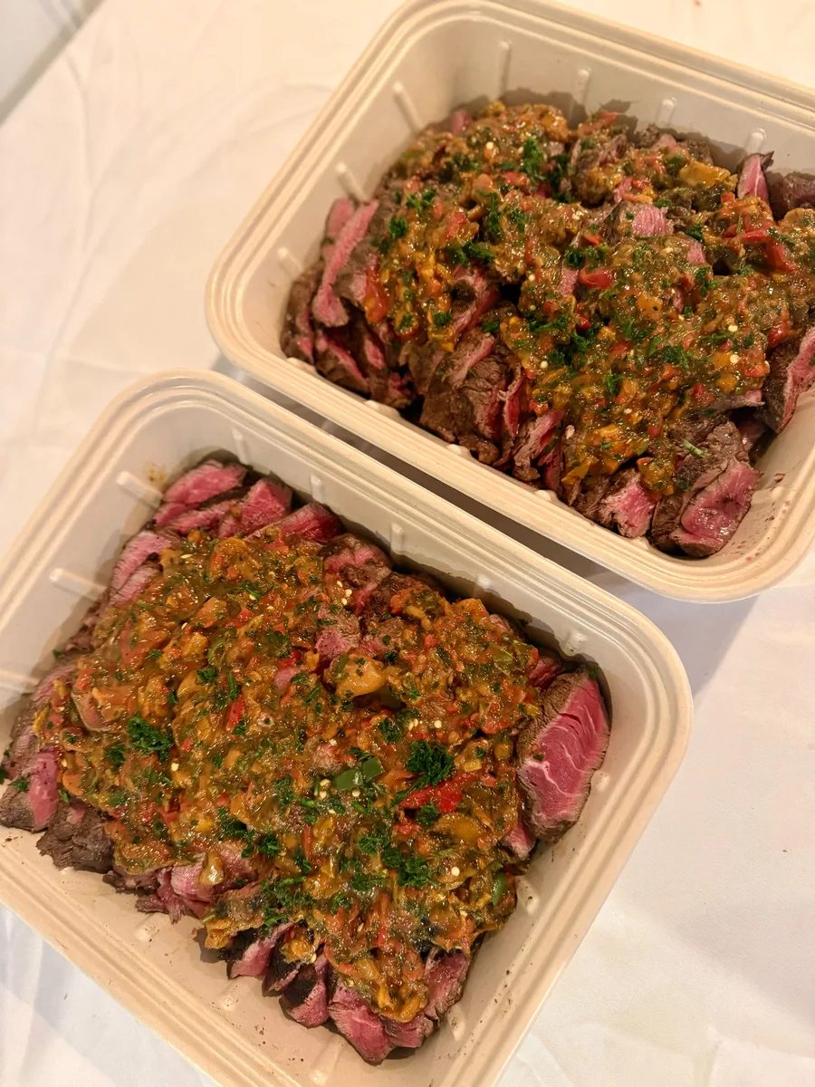 Sliced balsamic steak filet with orange pepper relish