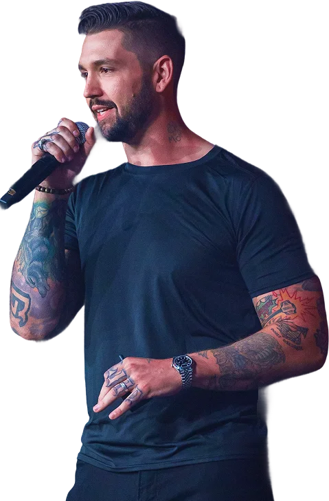 Drewbie Wilson speaking on stage