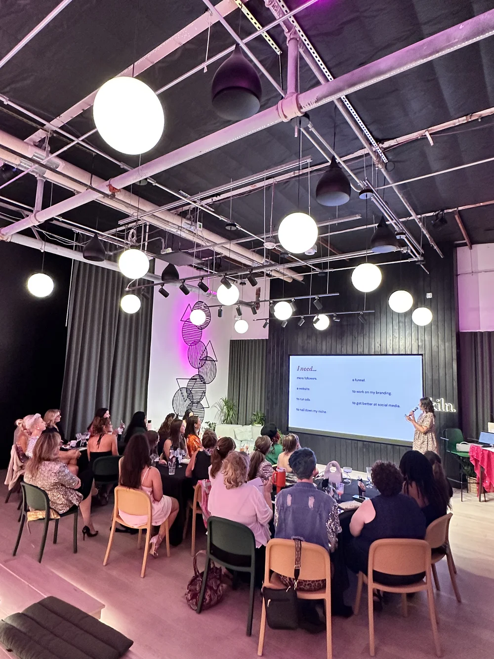 The room and audience at a Sparkle Party event