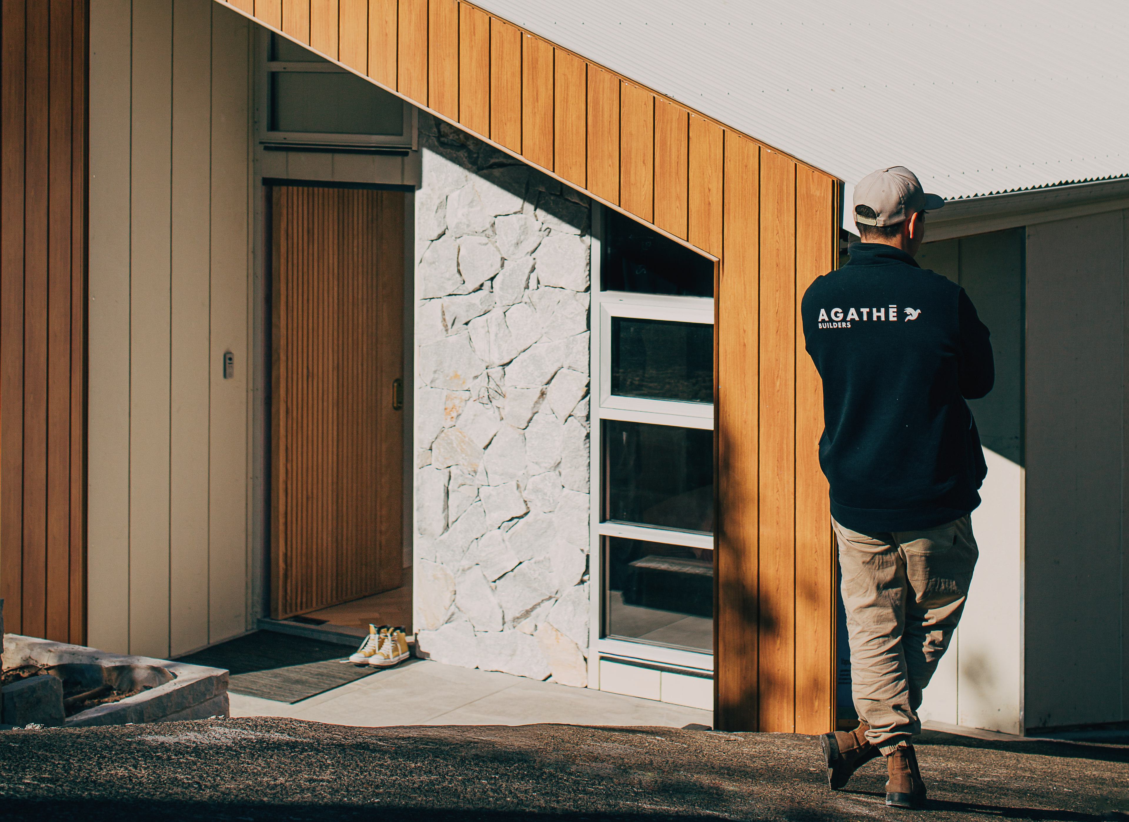 AGATHĒ Builders founder looking at Castle Hill finished extension project