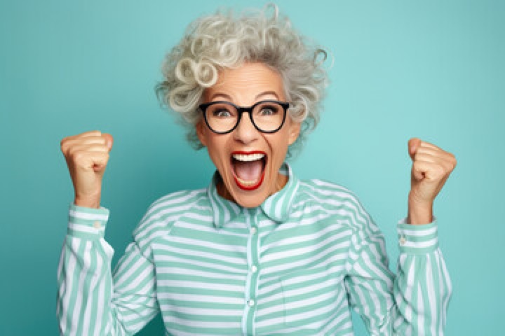 Woman pumping her fists.
