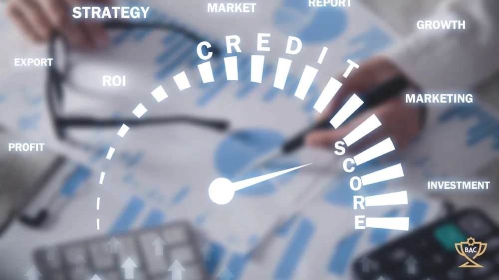 Credit score graphic floating over papers with charts, person holding pen and glasses on top of charts, with calculators at the sides