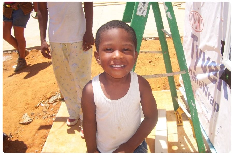 Smiling little boy at a worksite