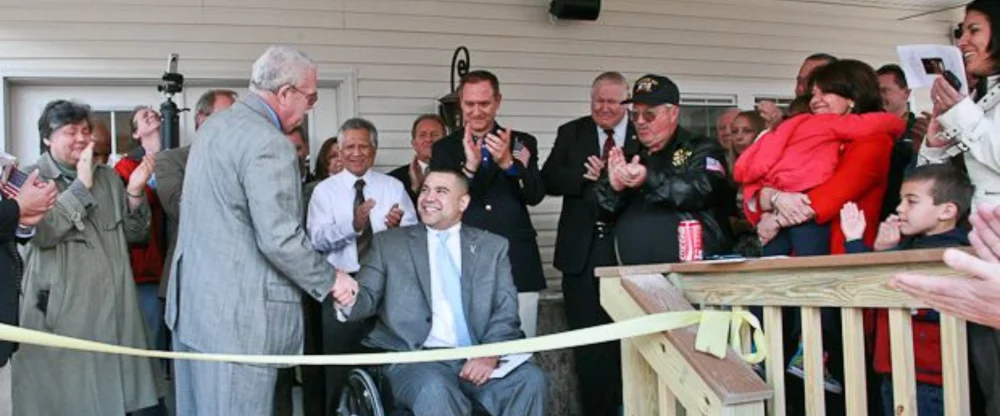 Disabled veteran at house dedication